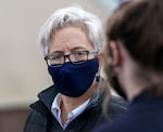 Tina Kotek tours the homeless shelter Arbor Lodge in North Portland, Jan. 20, 2022. 