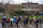 FILE - Portland Community College union members march through the Cascade campus in Northeast Portland, Ore., while on strike on March 11, 2026.