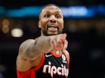 Damian Lillard of the Portland Trail Blazers reacts against the Phoenix Suns during the first quarter on Dec. 14, 2021, in Portland, Ore.