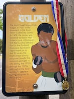 A Knott Street Boxing Club poster that recognizes the club's legacy in Portland's Albina neighborhood.