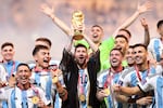 Lionel Messi of Argentina lifts the FIFA World Cup Qatar 2022 Winner's Trophy during the FIFA World Cup Qatar 2022 Final match between Argentina and France at Lusail Stadium on December 18, 2022 in Lusail City, Qatar.
