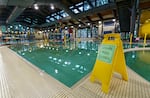 FILE — Pools like the one at Mt Scott Community center require adults to supervise children under 14, but that state rule may get revisited. This Portland pool, shown in this Jan. 19. 2022, is normally full of children but sat empty as shown in this file photo because of a shortage of staff.