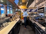 Mike Christman,  a registered environmental health specialist for Multnomah County, conducts a routine inspection of Black Bear Diner on May 13, 2026.