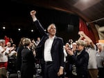 Raphaël Glucksmann, a French Socialist member of European Parliament, raises his fist at a meeting in support of 2024 legislative election candidate Pascale Got and the New Popular Front leftist alliance, in Blanquefort, southwestern France, on June 22.