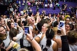 Cameron Brink, center, looking up, celebrates with Southridge High School teammate after winning the 2018 Oregon state basketball championship at the Chiles Center in Portland, Ore., March 10, 2018. Brink later transferred to Mountainside High School in Beaverton before attending Stanford.