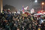 People march on the night of the election in Seattle, Tuesday, Nov. 3, 2020. (AP Photo/Ted S. Warren)