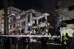 28 February 2027, Israel, Tel Aviv: Israeli first responders arrive at the scene of damage in Tel Aviv after Iranian ballistic missiles hit parts of the city in retaliation for coordinated US-Israeli airstrikes.
