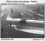 In this image captured by an Oregon Dept. of Transportation camera just before 10 a.m. on Feb. 5, a light dusting of snow has fallen along U.S. 26.