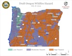 A map of Oregon showing much of it in high and moderate wildfire risk.