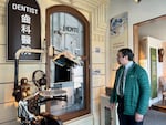 Weston Koyama looks at an exhibit about his great-grandfather Keizaburo Koyama’s dental office displayed at the Japanese American Museum of Oregon in Portland, Ore., on April 22, 2024.