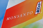 FILE: This Aug. 31, 2015 file photo shows the Monsanto logo on display at the Farm Progress Show in Decatur, Ill. 