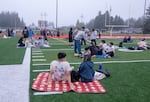 David Douglas High School students sit on blankets during a foggy Senior Sunrise on Sept. 4, 2024.