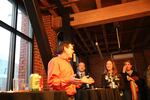 Portland Public Schools board leaders Tom Koehler (speaking, in orange shirt) and Amy Kohnstamm (second from right) celebrated the passage of a $790 million bond measure May 16, 2017.