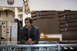 Dale Feathers, owner of Cascade Firearm and Supply, stands for a portrait in his store on September 14, 2018 in Vancouver, Washington.