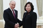 Russian President Vladimir Putin shakes hands with North Korean Foreign Minister Choe Son Hui during their meeting at the Kremlin in Moscow, Sunday, July 19, 2026.