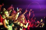 Fans in the front row at Crystal Ballroom for Gucci Mane's Trap God Tour in 2017.