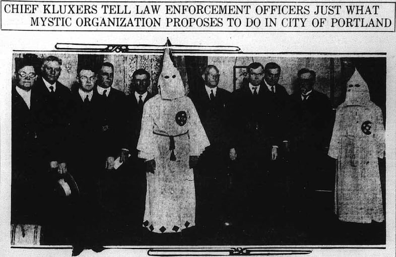 The Portland Telegram published this images of the KKK meeting with Portland leaders in 1921. Included are the city Chief of Police,  Captain of Police, the District Attorney and a sheriff