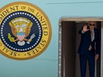 President Biden waves from Air Force One on July 6, 2023 at Andrews Air Force Base, Md., before flying to South Carolina.