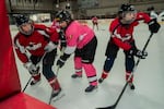 From left: Bea Lucas, Kristi Kenworthy and Jennifer Walker play in a recreational game at the Winterhawks Skating Center in Beaverton, Ore., Feb 15, 2026. Portland United Hockey League, which was started in 2022, is an adult league for women, trans and nonbinary players.