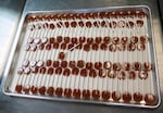 Jami Curl combines spicy and sweet with QUIN's famous chai lollipops.