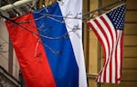 Russian and US flags are seen at the US Embassy in central Moscow on November 5, 2024, on the day of US Presidential election. 