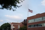 The American flag at Portland Fire & Rescue Station 1 flies at half-staff commemorating the terrorist attacks of Sept. 11, 2001.