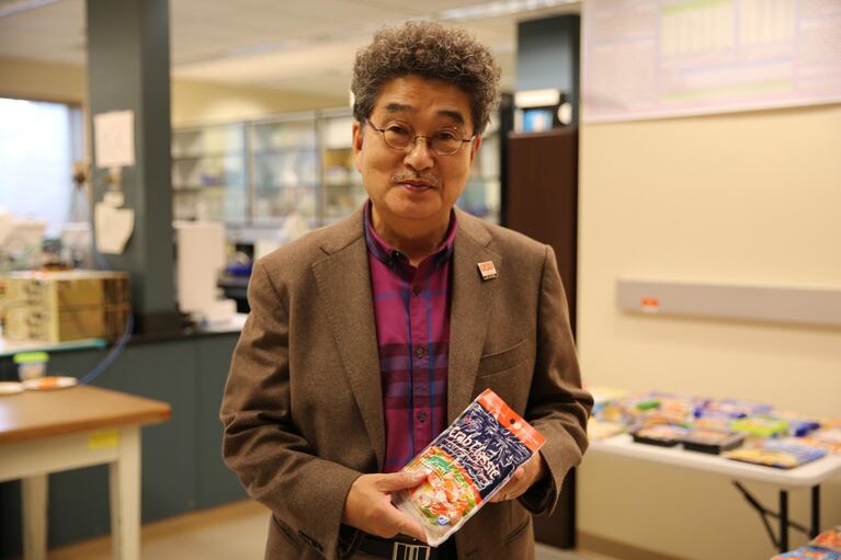 Jae Park holds a package of surimi, packaged and marketed to American consumers.