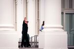 U.S. President Donald Trump waves as he arrives at the North Portico of the White House, on April 20, 2025 in Washington, DC. Trump traveled to Trump National Golf Club in Sterling, Virginia, on Easter.