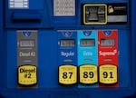 Gas prices over $6 a gallon are displayed on the digital screens on gas pumps at a Mobil station in Los Angeles on May 4.
