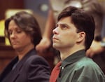 Lyle Menendez looks up during testimony in his and brother Erik's 1995 retrial for the shotgun slayings of their parents in Los Angeles.