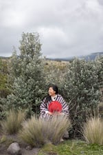 Paulina Iza Tipán (36), Cotopaxi National Park guide. Paulina walks on the moors of the Cotopaxi. She has lived near the Cotopaxi Volcano all her life and, even so, she says that every day she sees it differently. “I love it here, I will never get tired of coming here”. Cotopaxi, Ecuador. March Tuesday 5th, 2024. I chose this person and these photos because when I met Paulina she spread that joy of belonging to a place, of being happy where she is and with what she does. She loves to show tourists HER land, her place in the world. She is a quiet but very eloquent woman when it comes to guiding on her mountain.