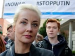 Yulia Navalnaya, widow of Alexey Navalny, stands in a queue with other voters at a polling station near the Russian embassy in Berlin, on Sunday.