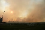 Old Trails Fire is seen from Dwight Merkel Sports Complex, Saturday, Aug. 1, 2026, in Spokane, Wash.