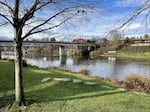 The Rogue River as seen from Grants Pass's Riverside Park, where people have been camping.