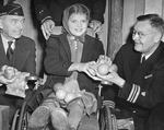 During the war, the Kiwanis of Portland invited thousands of children with disabilities to a Christmas party. This one was held in 1943.
