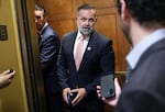 Representative Cory Mills stands near open elevator doors as he talks to reporters at the U.S. Capitol on April 22.