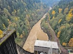 Water downstream of Green Peter dam on the South Santiam River, seen here on Nov. 3, turned muddy after a deep drawdown of the dam’s reservoir.