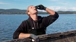 Travis Oja of Nevor Shellfish slurps an oyster seconds from the water. Fresh oysters in the raw are everything to an oyster lover, but it's not for the faint of heart. Often they are still alive. You can even their heartbeat.