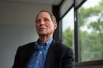 Sen. Ron Wyden, D-Ore., listens to a question during an interview at Oregon Public Broadcasting in Portland, Ore., on May 6, 2026.