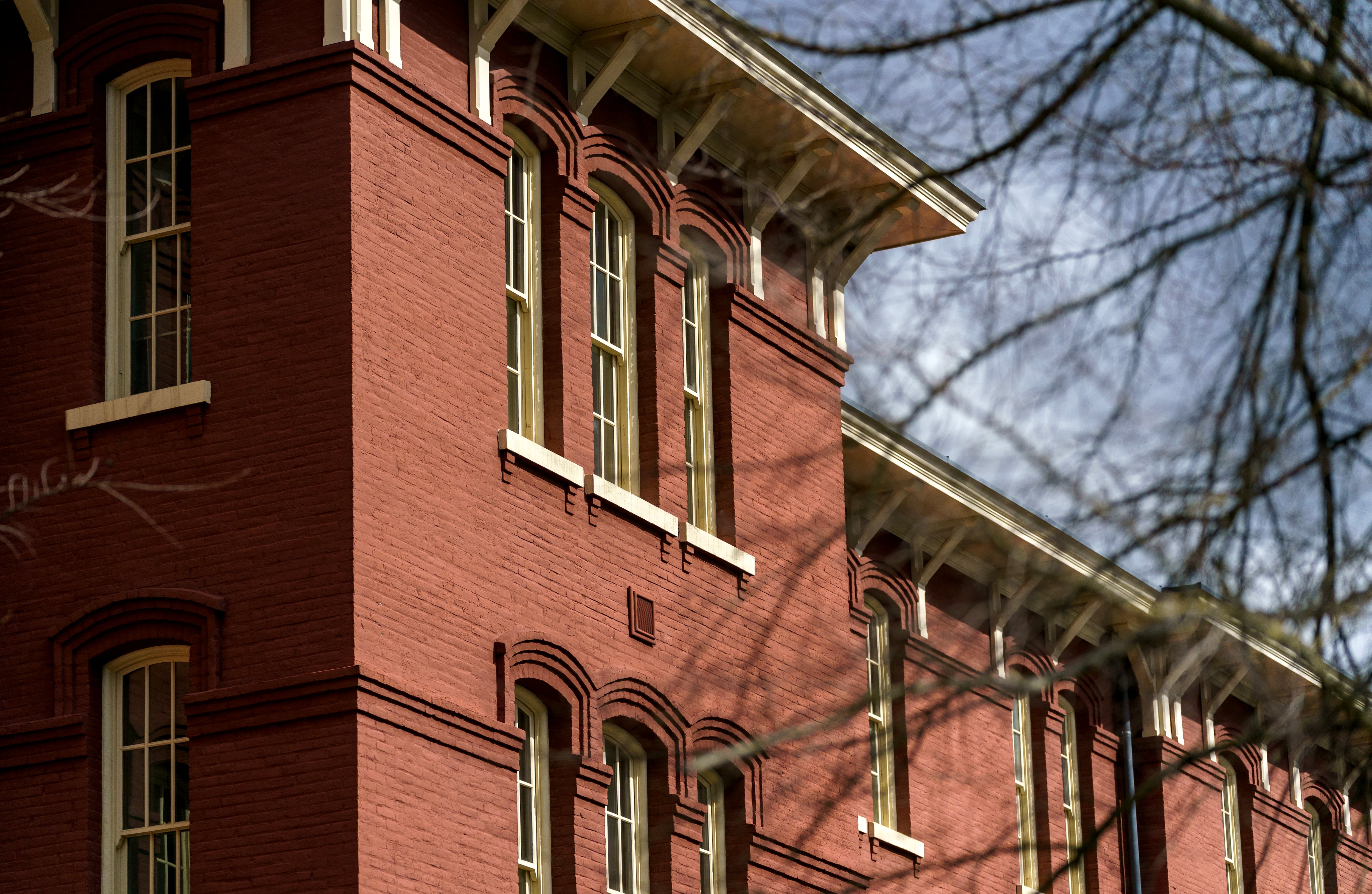 FILE - Oregon has started racking up fines of $500 per day for each person who has to wait in a local jail cell for more than a week before admission to Oregon State Hospital, shown in here in this March 8, 2023 file photo.