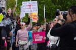 Hundreds of pro-abortion rights advocates rallied in front of the Idaho Capitol Saturday May 14, 2022. They were protesting a leaked opinion from the U.S. Supreme Court that's poised to overturn Roe v. Wade, which guaranteed a constitutional right to the procedure.