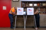 People vote in the primary election at Northwestern High School in Detroit, Tuesday.