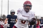 Central Catholic wide receiver Silas Starr (8) catches a pass and runs it in for the touchdown. The Central Catholic Rams played the Lake Oswego Lakers at Hillsboro Stadium in Hillsboro, Oregon, on Dec. 7, 2019. The Rams defeated the Lakers 49-28.