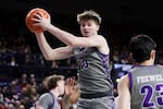 Portland guard Garrett Nuckolls (10) grabs a rebound during the second half of an NCAA college basketball game against Gonzaga Wednesday, Feb. 25, 2026, in Spokane, Wash.