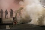 Federal officers deploy gas to disperse crowds of protesters near the Mark O. Hatfield federal courthouse in Portland, Ore., July 20, 2020.