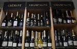 Bottles of Champagne are for sale at a wine dealer shop as President Donald Trump threatened a 200% tariff on European wine, Champagne and spirits if the European Union goes forward with a planned tariff on American whiskey, Thursday, March 13, 2025 in Ville d'Avray, outside Paris.