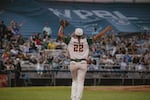Sabrina Robinson, first basemen for the Boston Hunters, dances in between innings and riles up fans during her team's first game in the Women's Pro Baseball League. Springfield, IL, August 2, 2026.