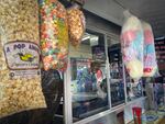 Popcorn, cotton candy, and other sweet treats are in abundance at the Oregon State Fair in Salem, Ore. Aug. 29, 2022