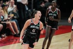 Portland Fire forward Bridget Carleton (6) reacts after making a basket during the second half of a WNBA basketball game against the Chicago Sky, Saturday, May 9, 2026, in Portland, Ore. (AP Photo/Jenny Kane)