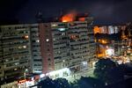 This photo released by Romania's Department for Emergency Situations shows a fire on top of a block of flats after a drone crash caused an explosion and fire on impact, in Galati, eastern Romania near the Ukrainian border, Friday May 29, 2026.